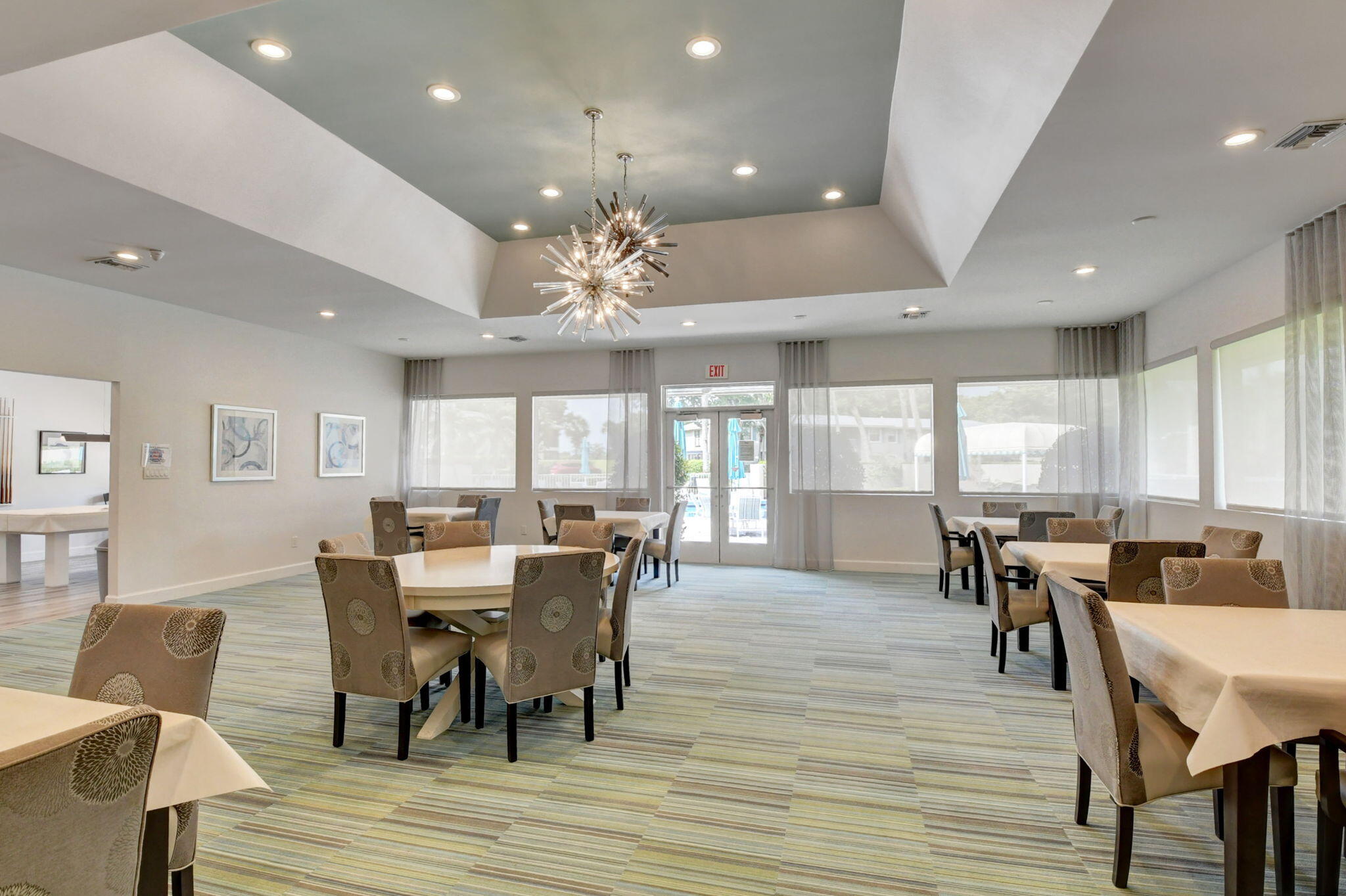 3 Westgate Lane, Unit C Boynton Beach, FL 33436 - Photo 67 of 98 a view of a dining room with furniture and wooden floor