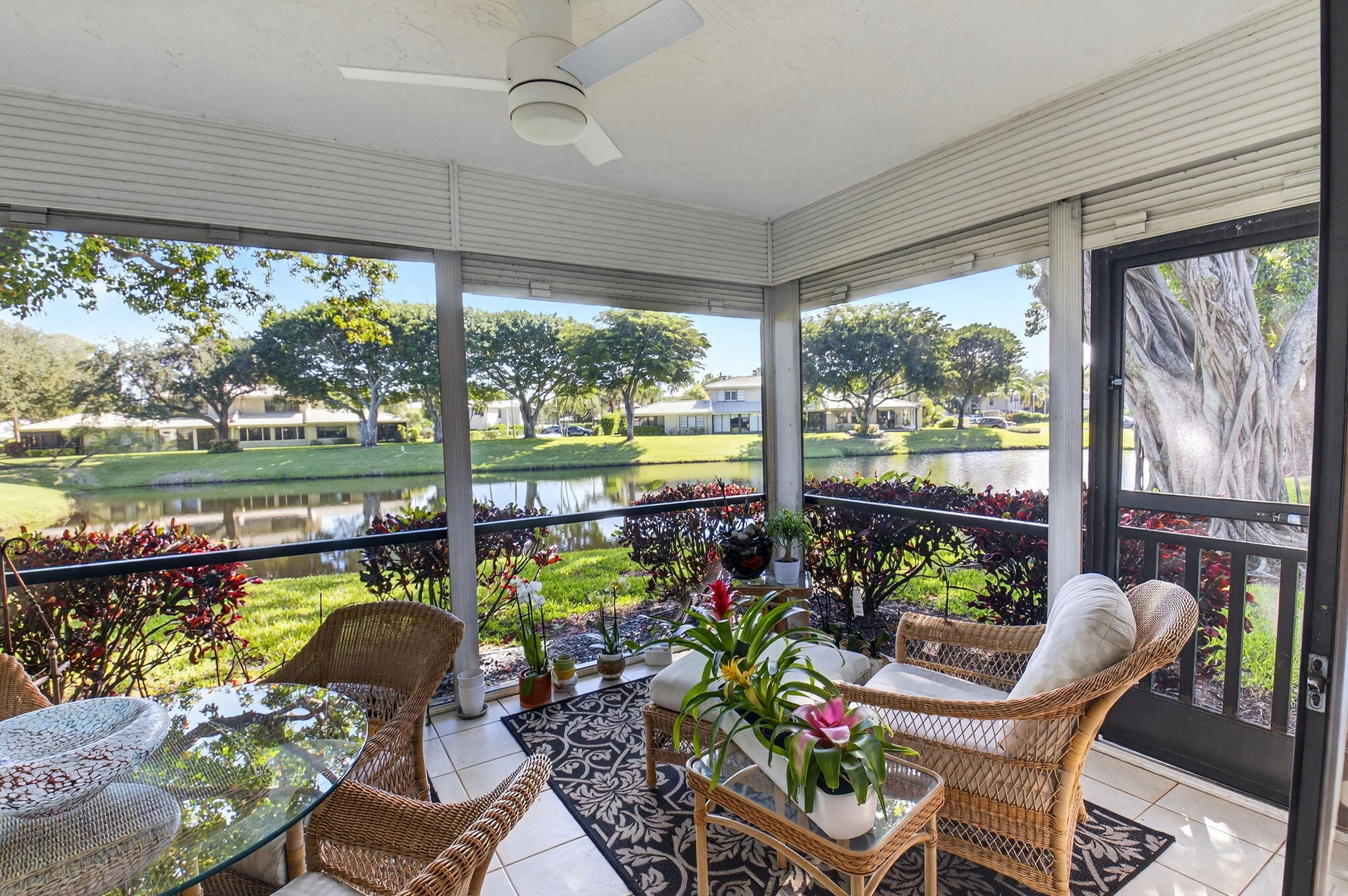 3 Westgate Lane, Unit C Boynton Beach, FL 33436 - Photo 10 of 98 a outdoor dining space with furniture and garden view