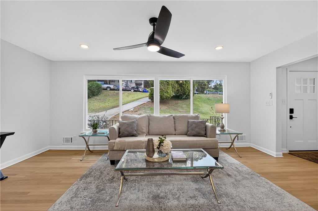 2967 Flat Shoals Road Decatur, GA 30034 - Photo 12 of 37 a living room with furniture and a large window