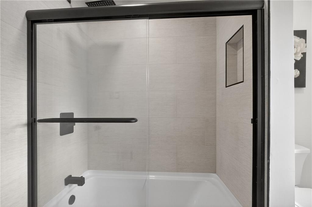 2967 Flat Shoals Road Decatur, GA 30034 - Photo 31 of 37 a bathroom with a bathtub