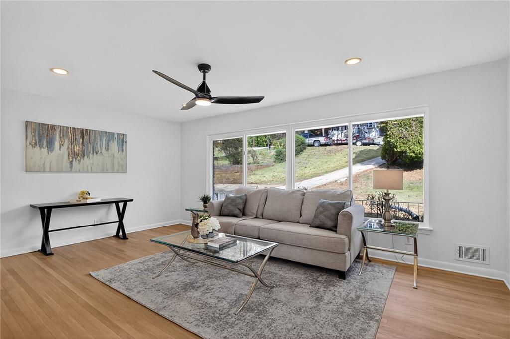 2967 Flat Shoals Road Decatur, GA 30034 - Photo 10 of 37 a living room with furniture and a large window