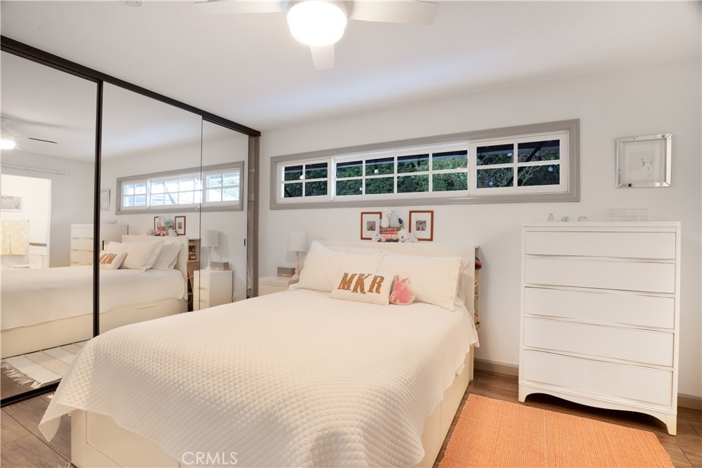 419 Gloucester Drive Costa Mesa, CA 92627 - Photo 16 of 51 a bedroom with a bed and a window