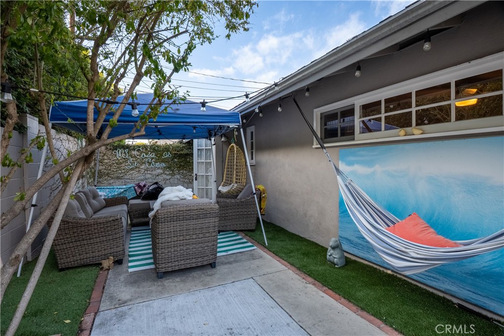 419 Gloucester Drive Costa Mesa, CA 92627 - Photo 25 of 51 a view of a backyard with sitting area