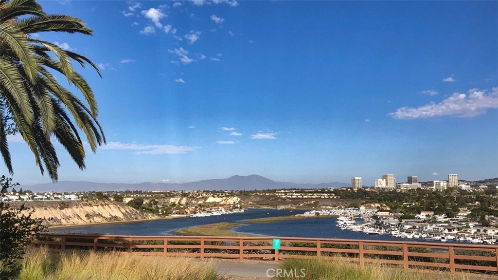 419 Gloucester Drive Costa Mesa, CA 92627 - Photo 40 of 51 a view of a city with lots of residential buildings ocean and mountain view