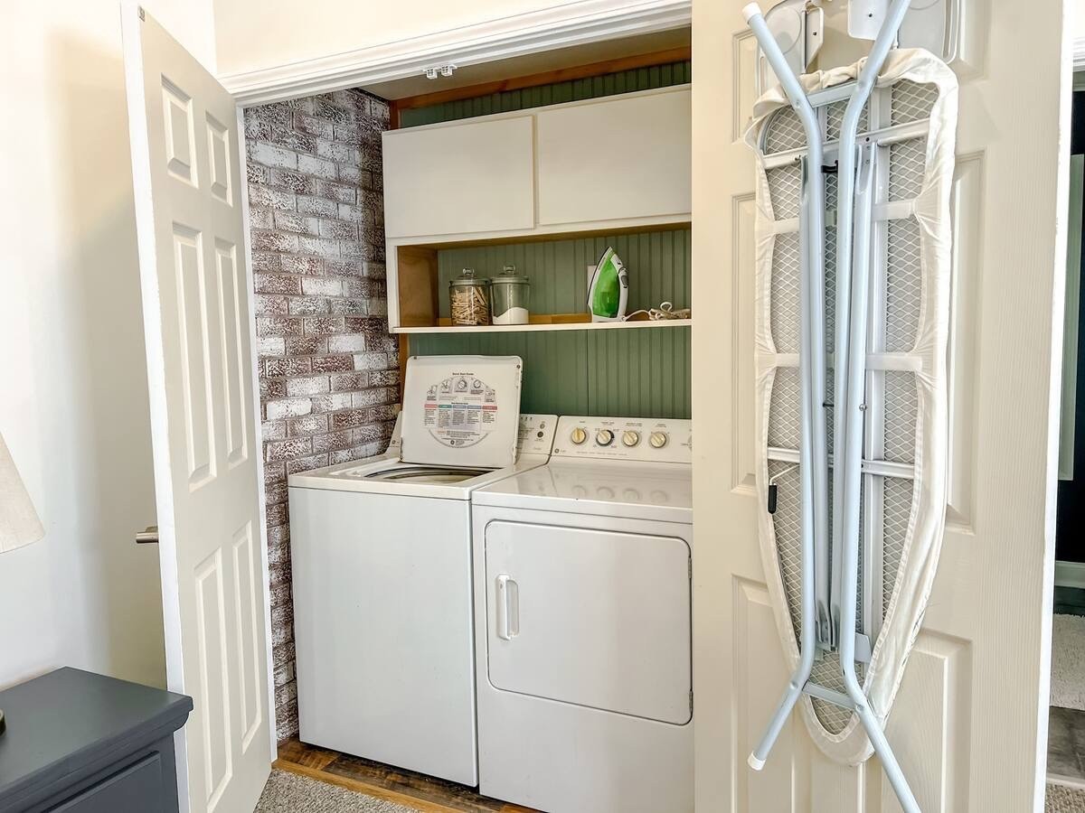 701 Morton Road Murfreesboro, TN 37128 - Photo 17 of 24 a view of washer and dryer with wooden floor