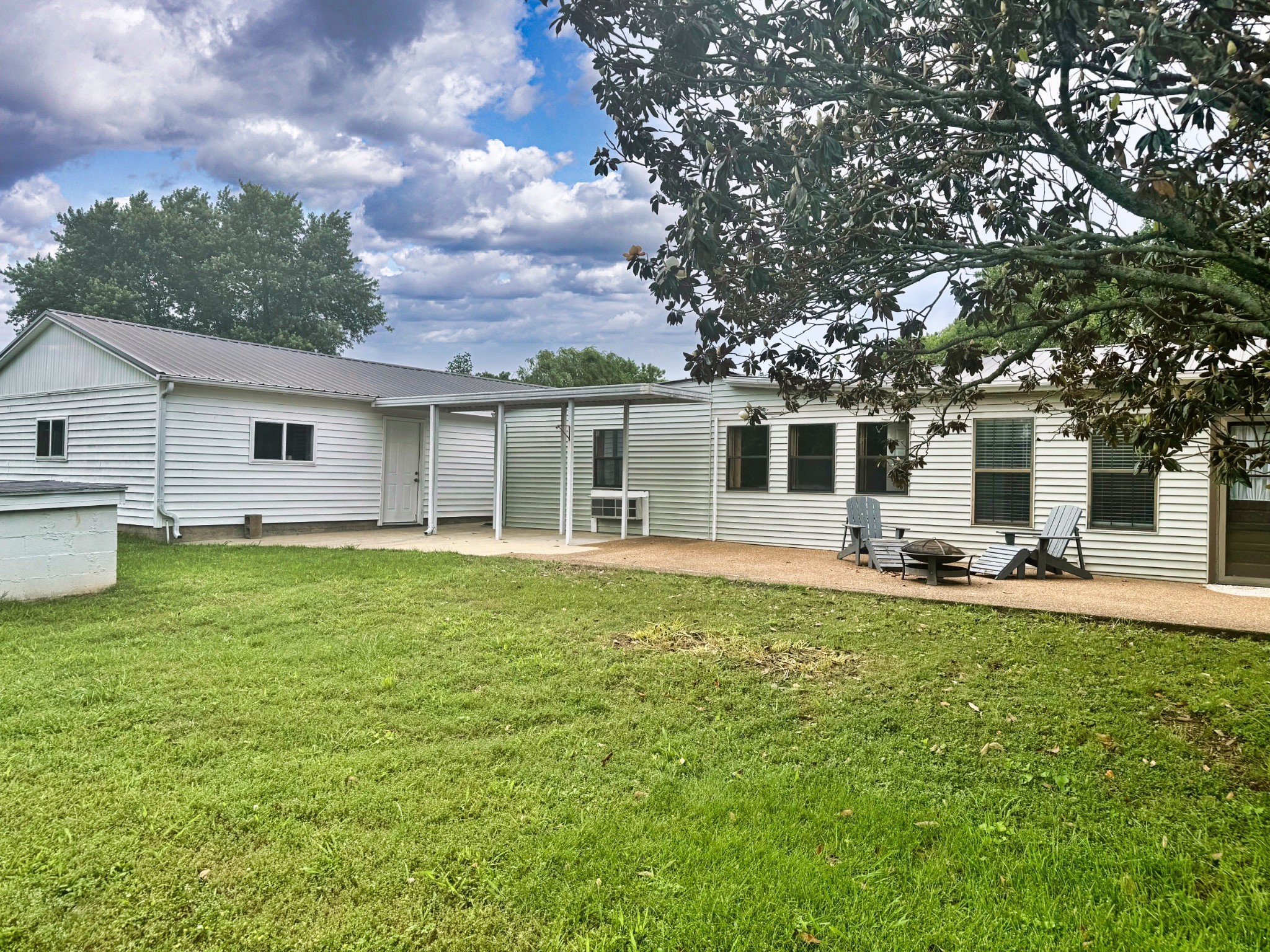 701 Morton Road Murfreesboro, TN 37128 - Photo 19 of 24 a front view of house with yard barbeque and outdoor seating