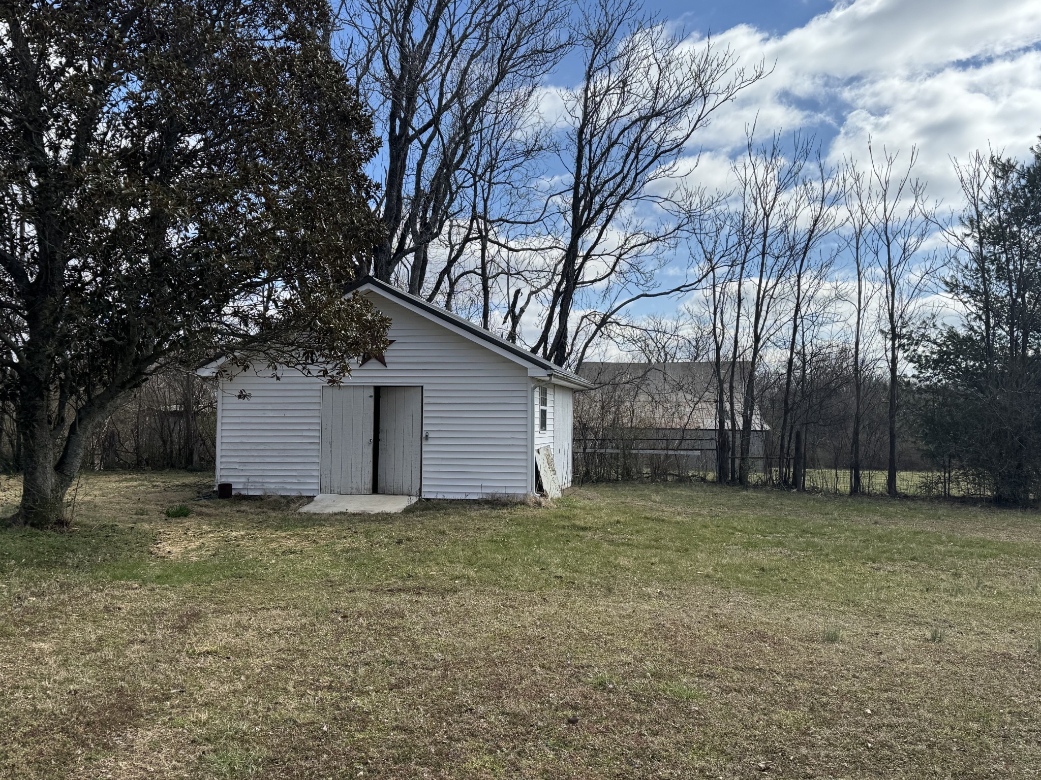 701 Morton Road Murfreesboro, TN 37128 - Photo 24 of 24 a house with a tree in the background