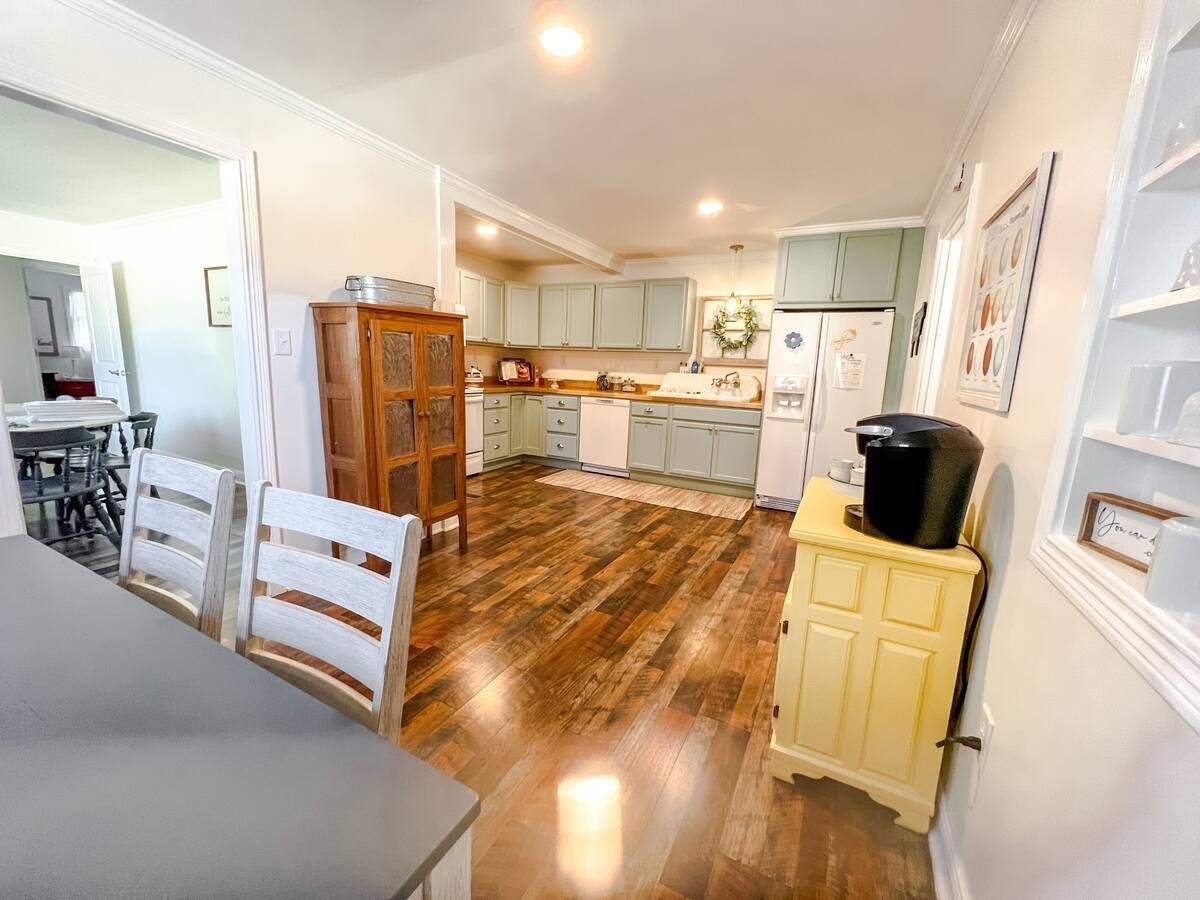 701 Morton Road Murfreesboro, TN 37128 - Photo 8 of 24 a view of a kitchen with furniture and wooden floor