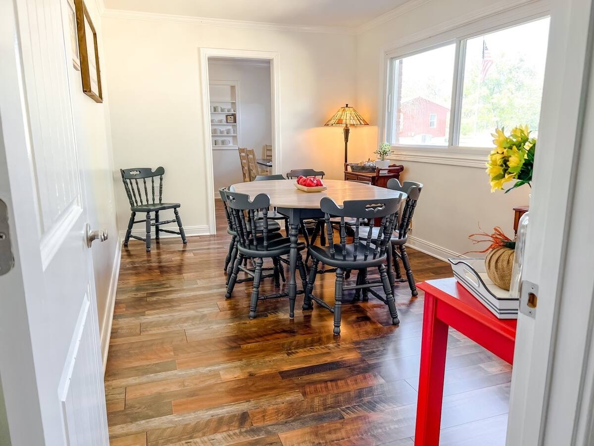 701 Morton Road Murfreesboro, TN 37128 - Photo 10 of 24 a view of a dining room with furniture and wooden floor