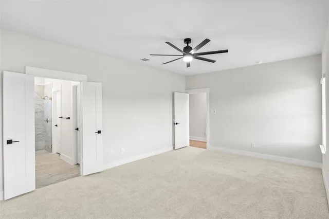 a bathroom with a sink double vanity and shower
