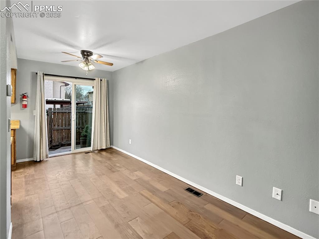 3033 Starlight Circle Colorado Springs, CO 80916 - Photo 12 of 44 an empty room with entrance and a shower