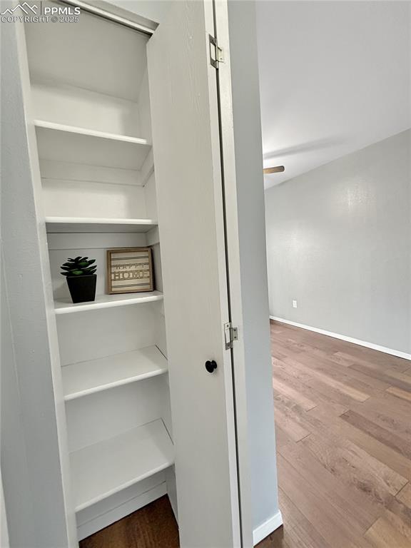 3033 Starlight Circle Colorado Springs, CO 80916 - Photo 14 of 44 a view of an empty walk in closet