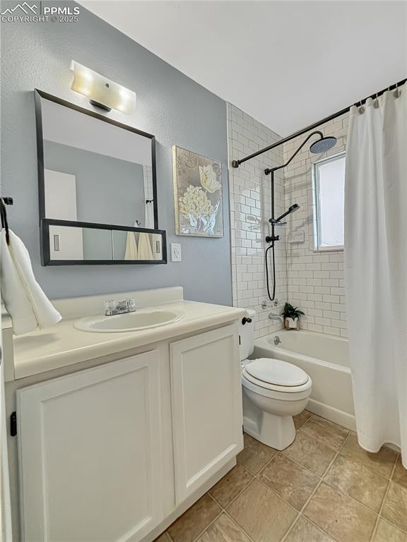 3033 Starlight Circle Colorado Springs, CO 80916 - Photo 22 of 44 a bathroom with a sink toilet and a mirror