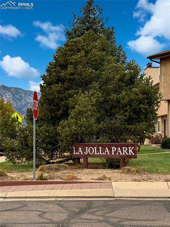 3033 Starlight Circle Colorado Springs, CO 80916 - Photo 37 of 44 a view of a house with a yard