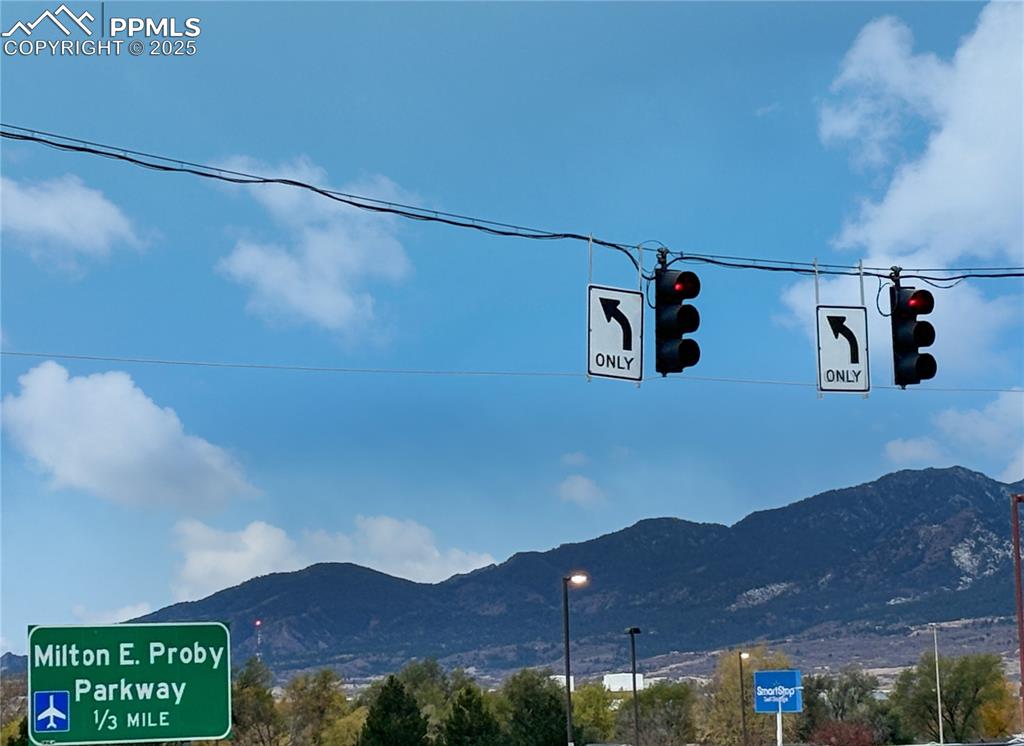3033 Starlight Circle Colorado Springs, CO 80916 - Photo 43 of 44 a view of a house with a mountain view