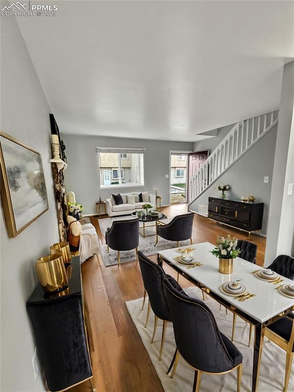 3033 Starlight Circle Colorado Springs, CO 80916 - Photo 5 of 44 a view of a dining room with furniture