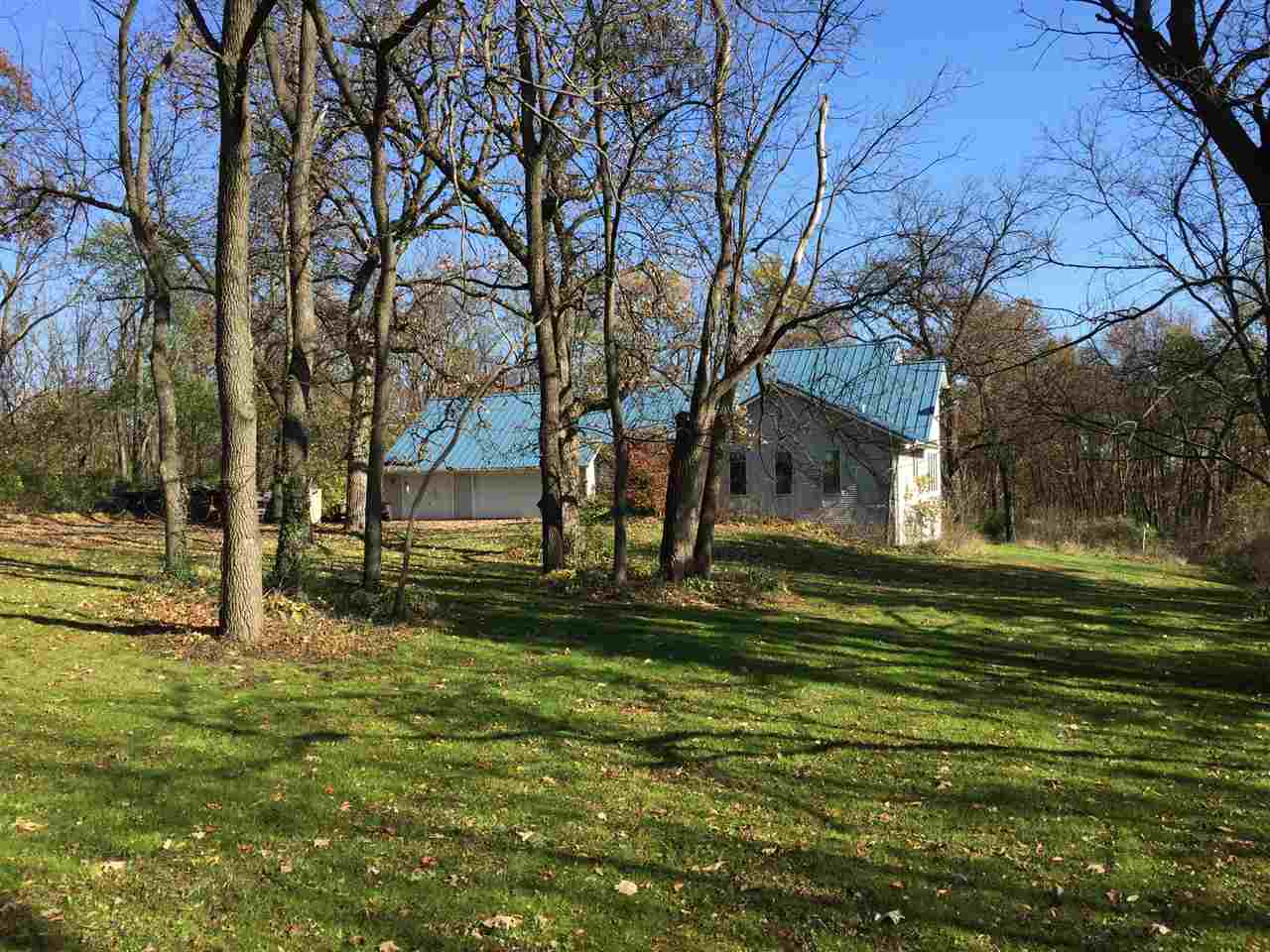 3275 North Meridian Road Stillman Valley, IL 61084 - Photo 1 of 24 a view of a house with a yard