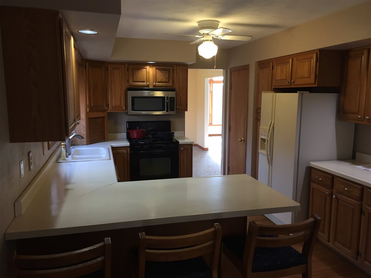 3275 North Meridian Road Stillman Valley, IL 61084 - Photo 11 of 24 a kitchen with cabinets and stainless steel appliances