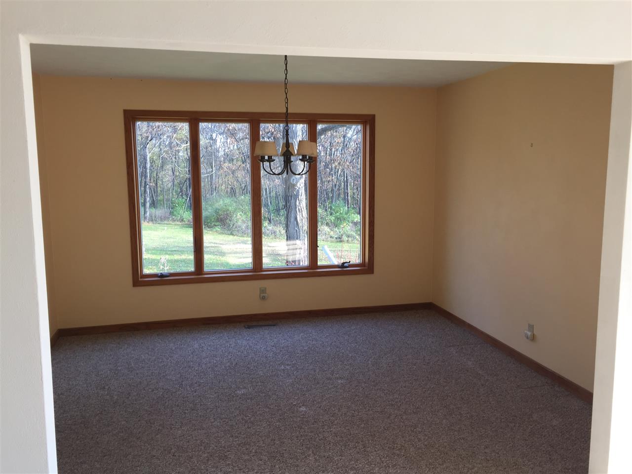 3275 North Meridian Road Stillman Valley, IL 61084 - Photo 12 of 24 an empty room with a window