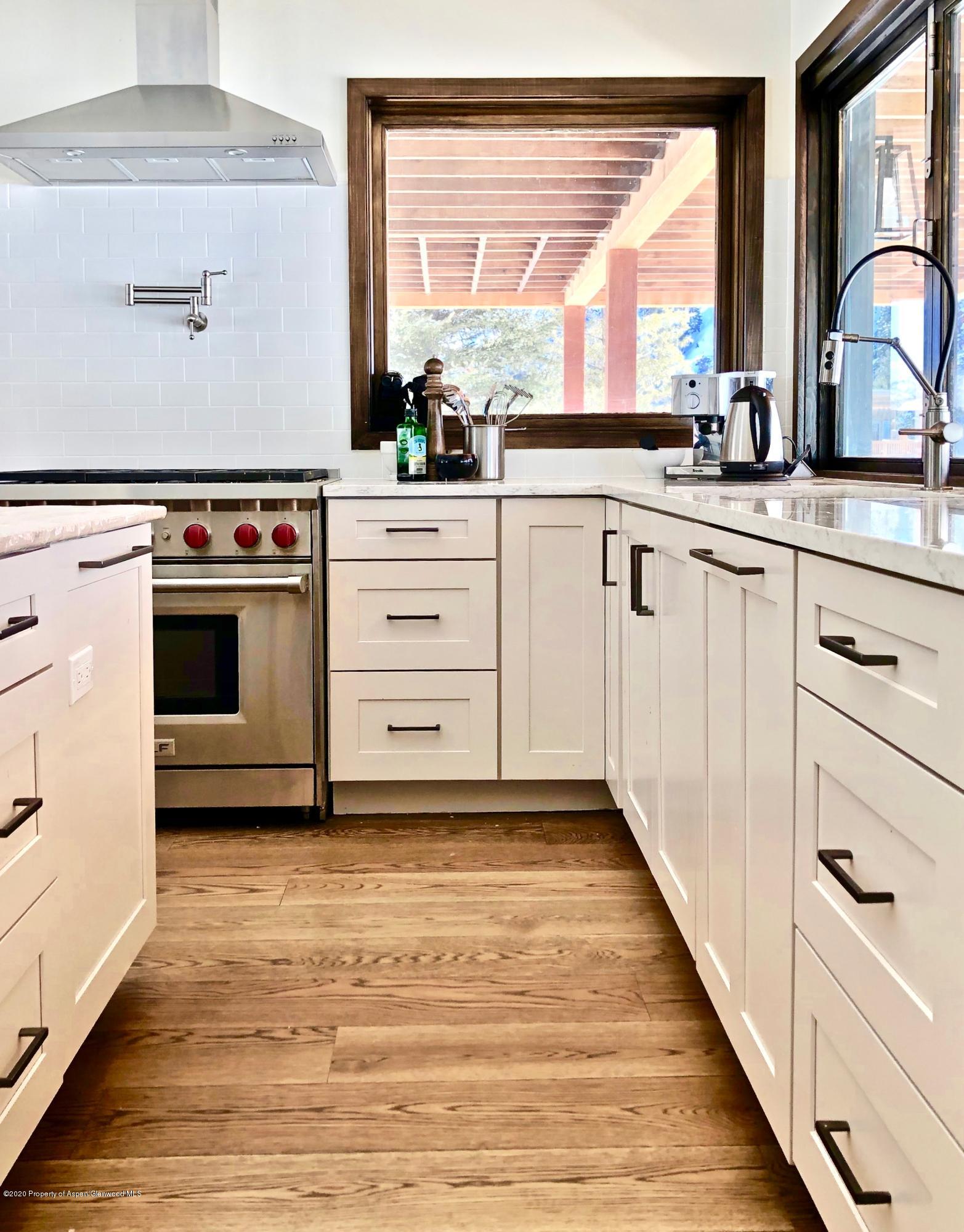103 Stackyard Lane Basalt, CO 81621 - Photo 2 of 25 The Kitchen opens to the back yard