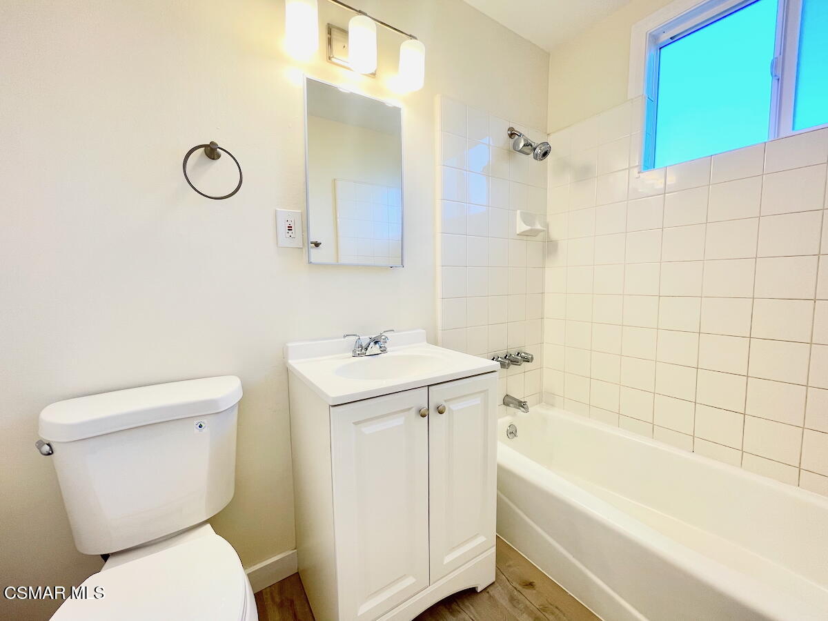 6334 Caroline Avenue Simi Valley, CA 93063 - Photo 17 of 30 a bathroom with a toilet sink and bathtub