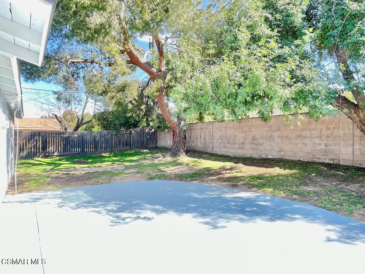 6334 Caroline Avenue Simi Valley, CA 93063 - Photo 21 of 30 a view of a yard with a house
