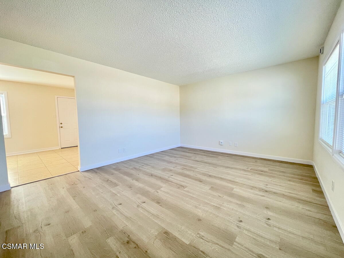 6334 Caroline Avenue Simi Valley, CA 93063 - Photo 5 of 30 an empty room with wooden floor