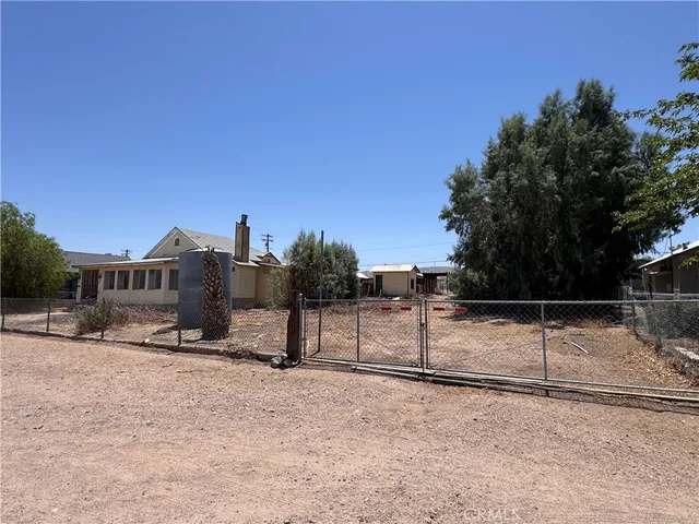 a kitchen with a stove cabinets and window