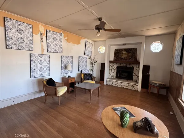 a bed room with furniture and a window