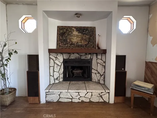 a view of a balcony with wooden floor