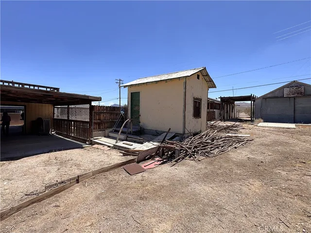 a view of a livingroom with furniture and windows