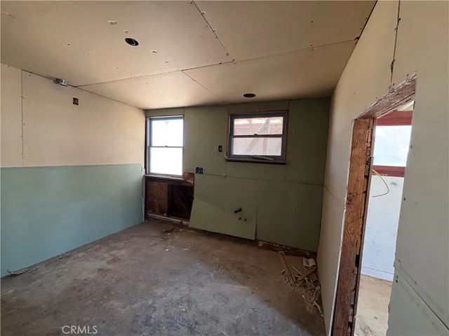 a view of a backyard of the house