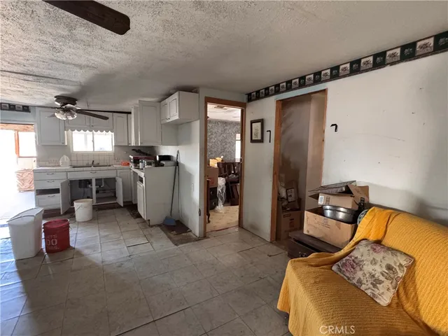 a bathroom with a toilet and a mirror