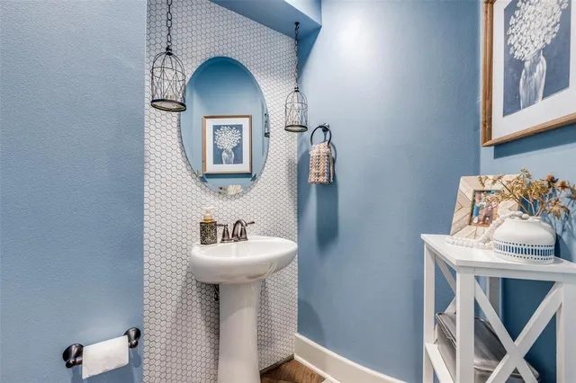 a view of living room with furniture and a floor to ceiling window