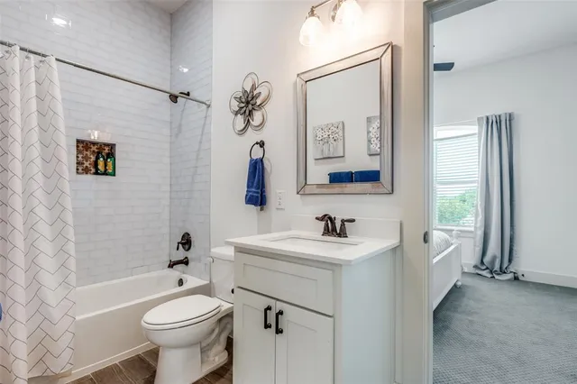 a room with table soccer and a ceiling fan