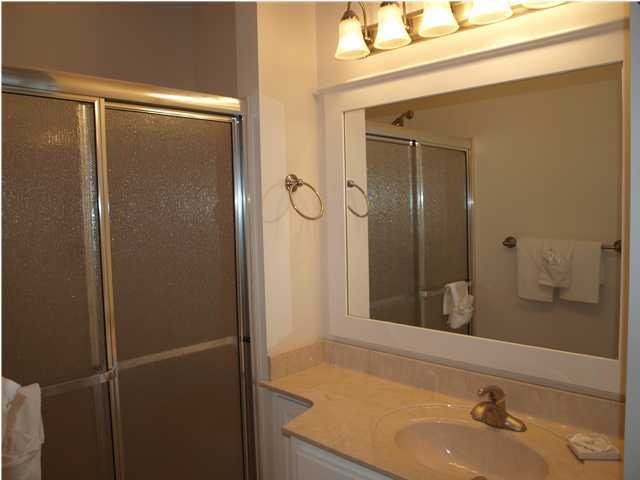60 Brown Street Santa Rosa Beach, FL 32459 - Photo 14 of 17 a bathroom with a shower and a sink