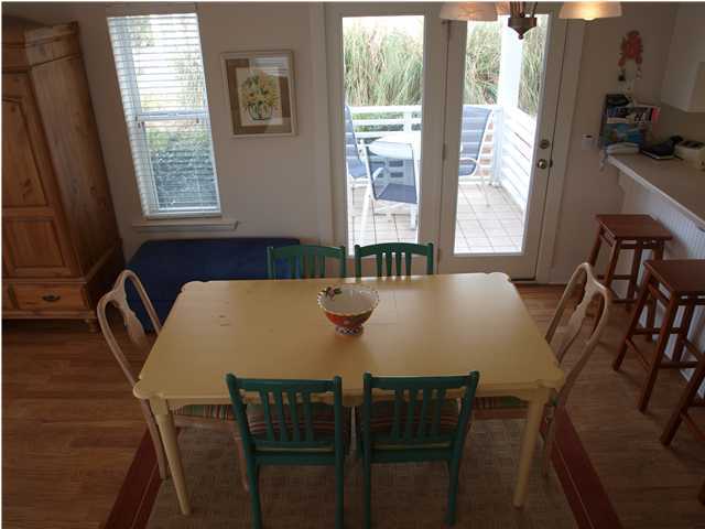 60 Brown Street Santa Rosa Beach, FL 32459 - Photo 6 of 17 a view of a dining room with furniture window and outside view