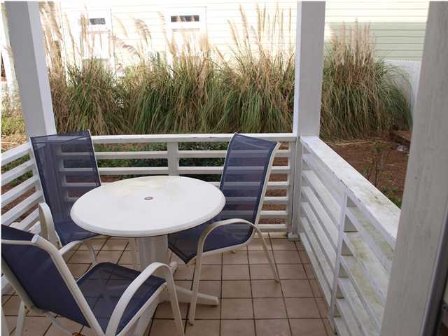 60 Brown Street Santa Rosa Beach, FL 32459 - Photo 10 of 17 a view of balcony with table and chairs