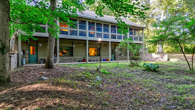 a front view of a building with a porch