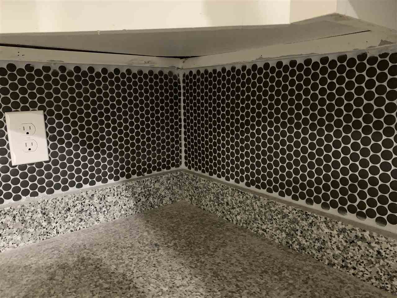 4861 Quince Road Memphis, TN 38117 - Photo 6 of 14 Kitchen boasts a chic penny round backsplash over granite countertops