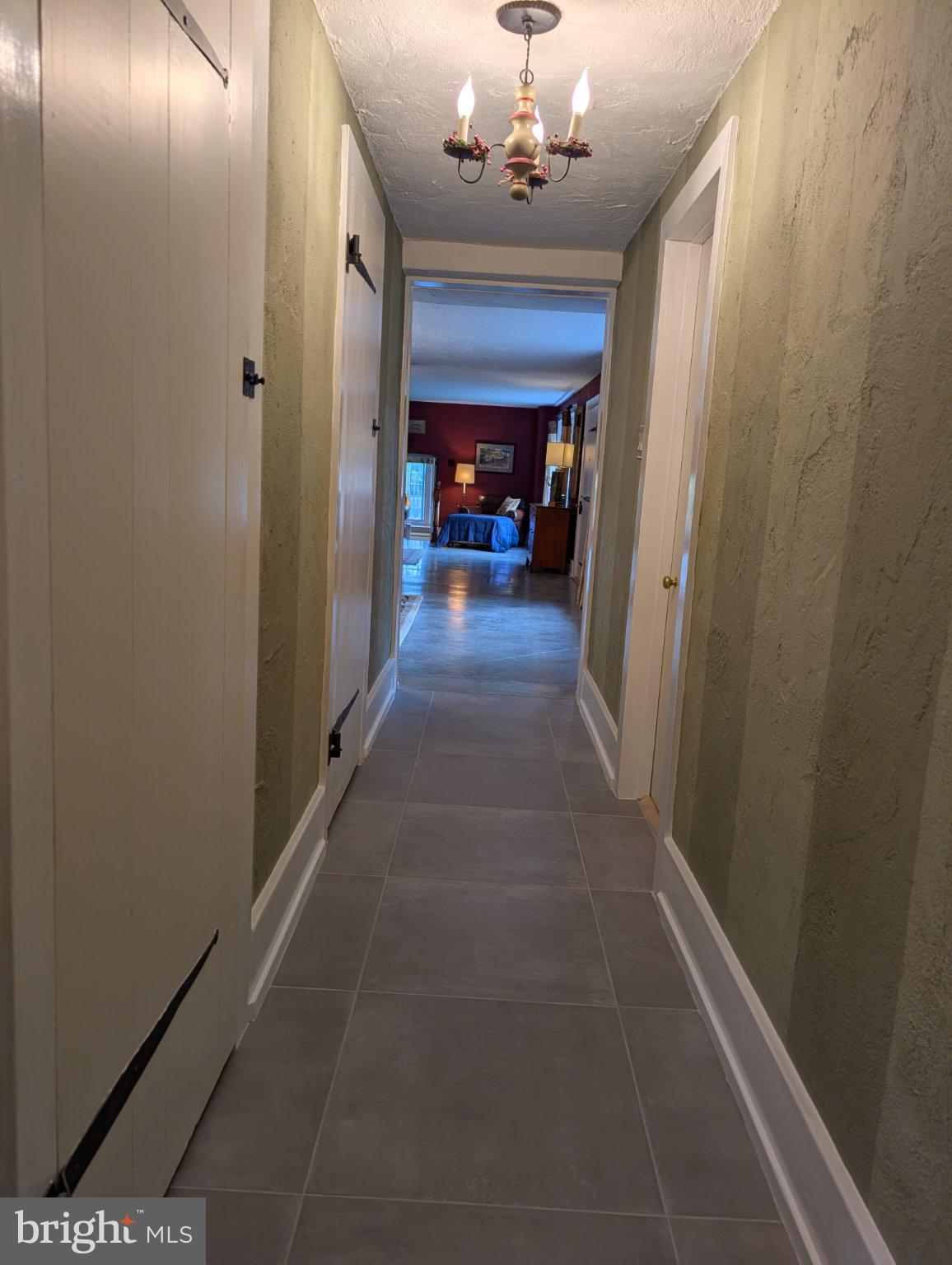 512 Swedesford Road Ambler, PA 19002 - Photo 9 of 27 Wide Hallways w/ New 2 x 2 Tile Flooring