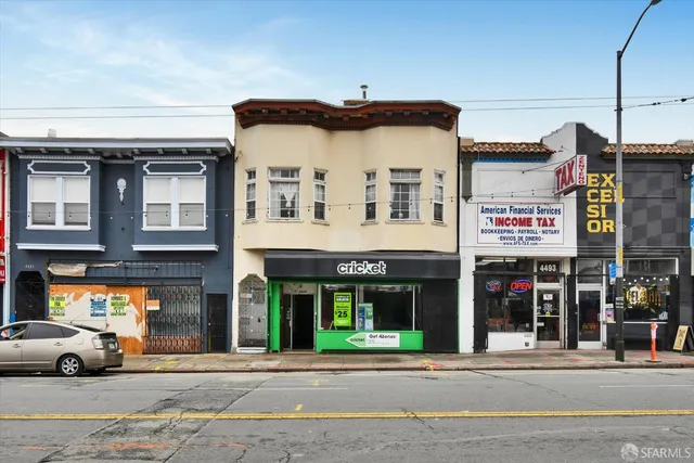 a view of a building with a street