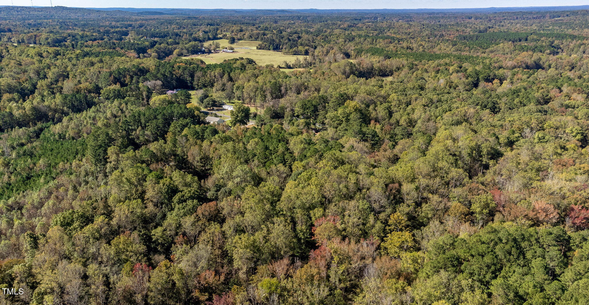 0 Neville Road Chapel Hill, NC 27516 - Photo 13 of 22 an aerial view of residential houses with outdoor space and trees