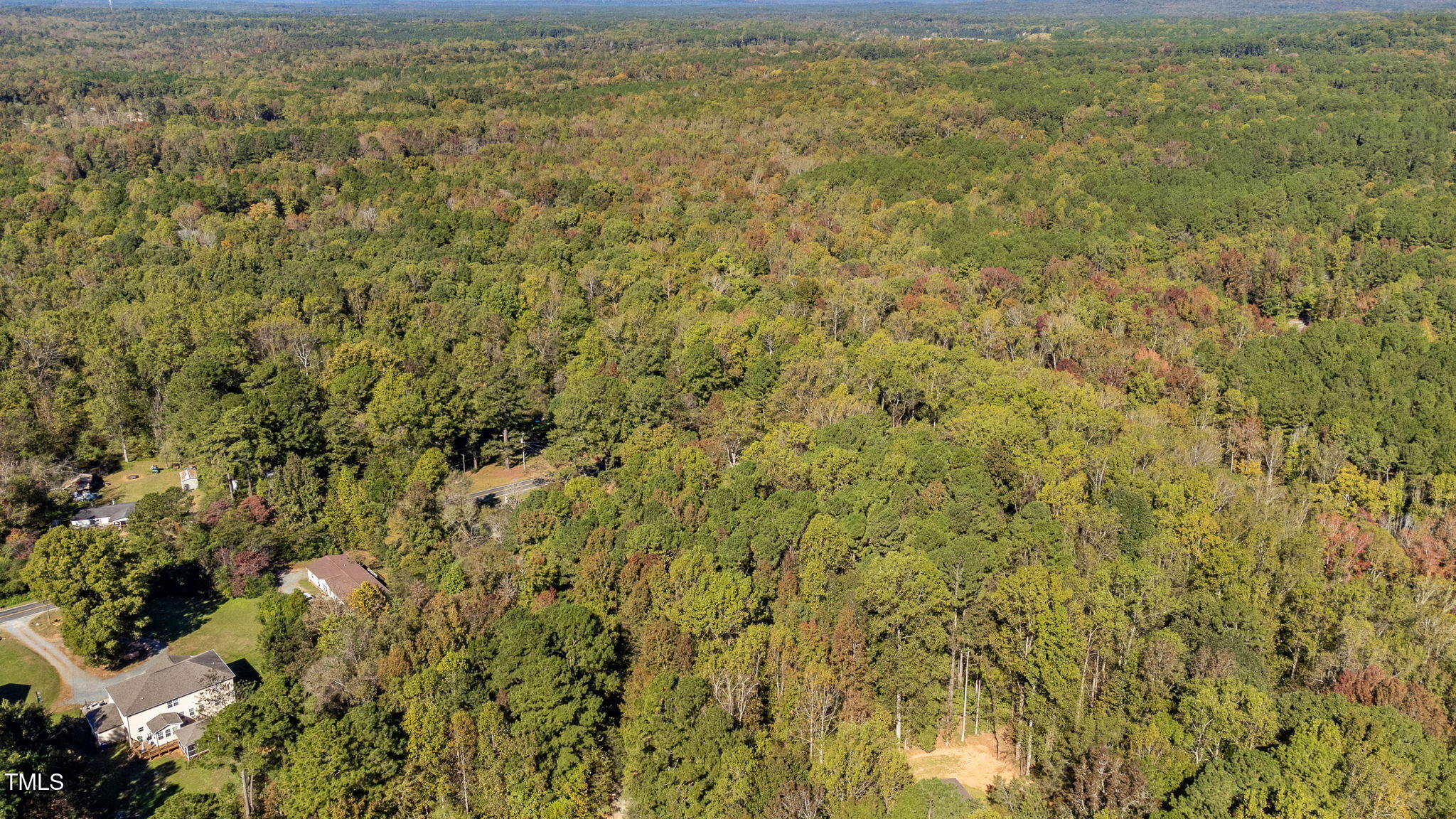 0 Neville Road Chapel Hill, NC 27516 - Photo 17 of 22 a view of a field with an trees in the background