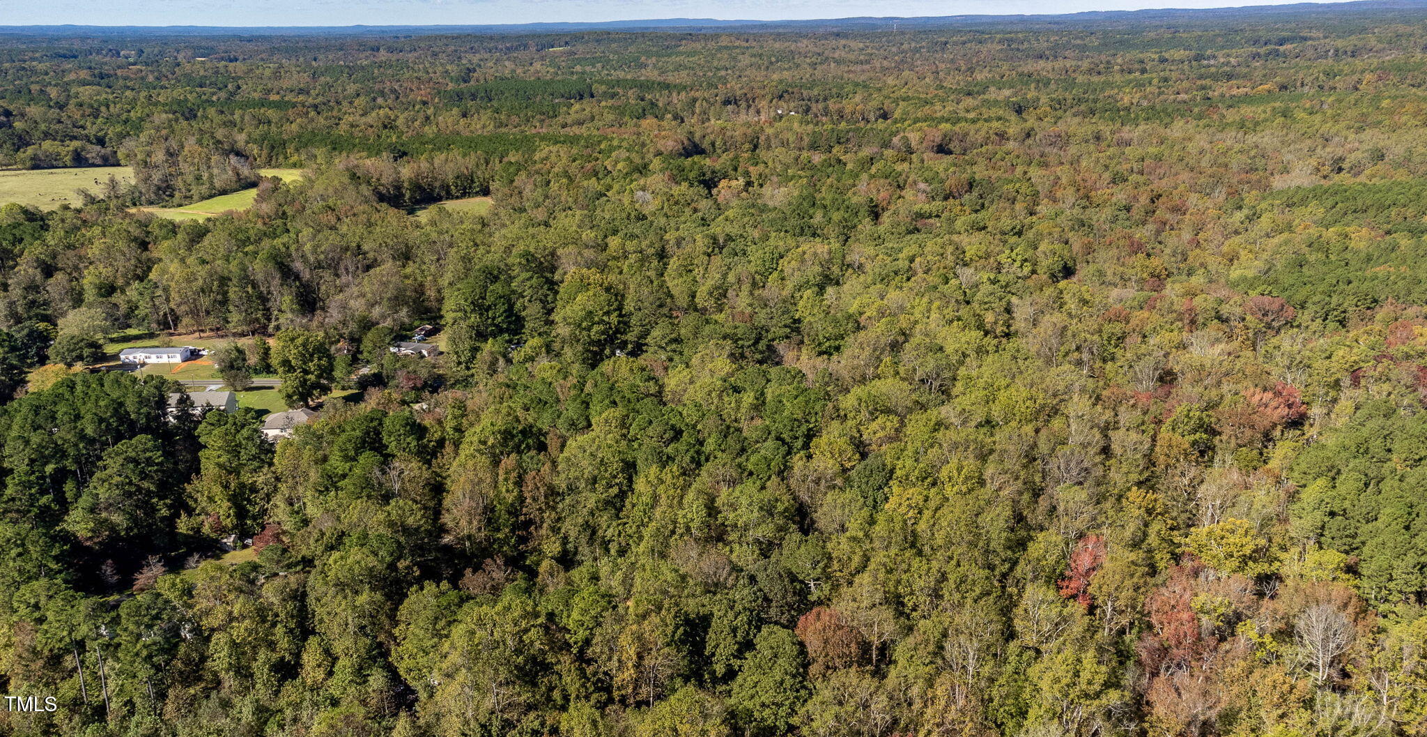 0 Neville Road Chapel Hill, NC 27516 - Photo 19 of 22 an aerial view of residential houses with outdoor space and covered