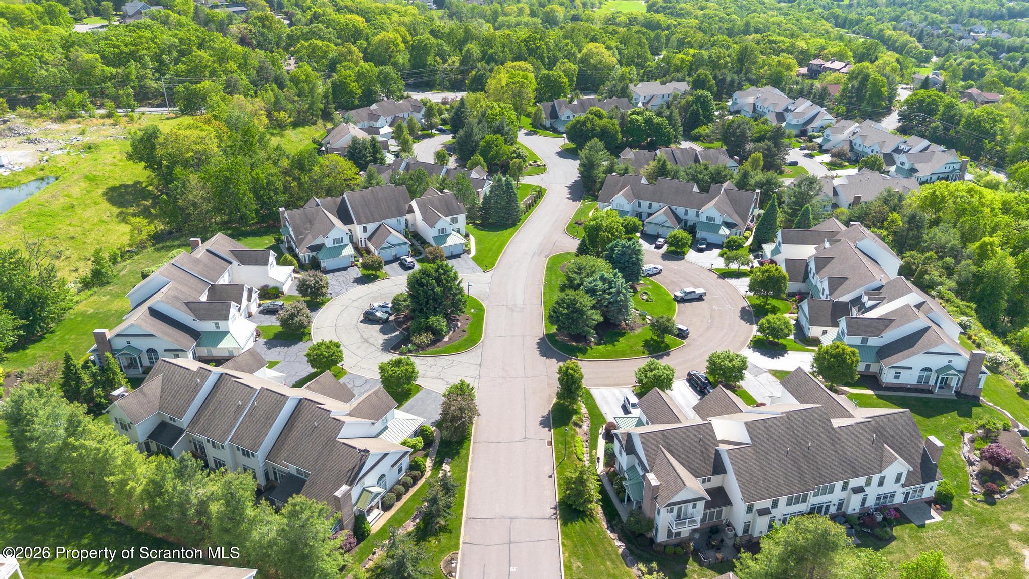 1502 Verne Cl Moosic, PA 18507 - Photo 43 of 46 an aerial view of residential houses with outdoor space and parking