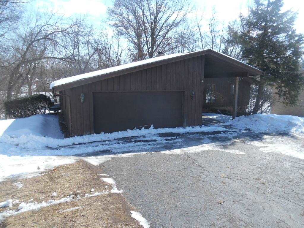 4951 Brookview Road Rockford, IL 61107 - Photo 1 of 19 a backyard of a house