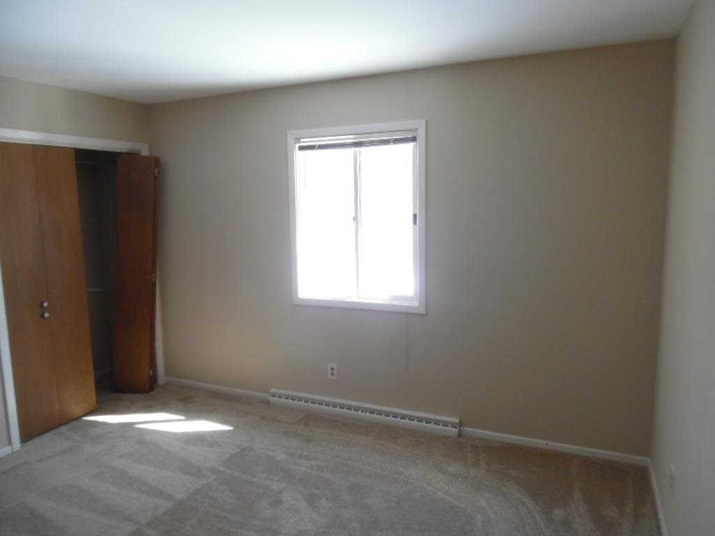 4951 Brookview Road Rockford, IL 61107 - Photo 12 of 19 an empty room with windows