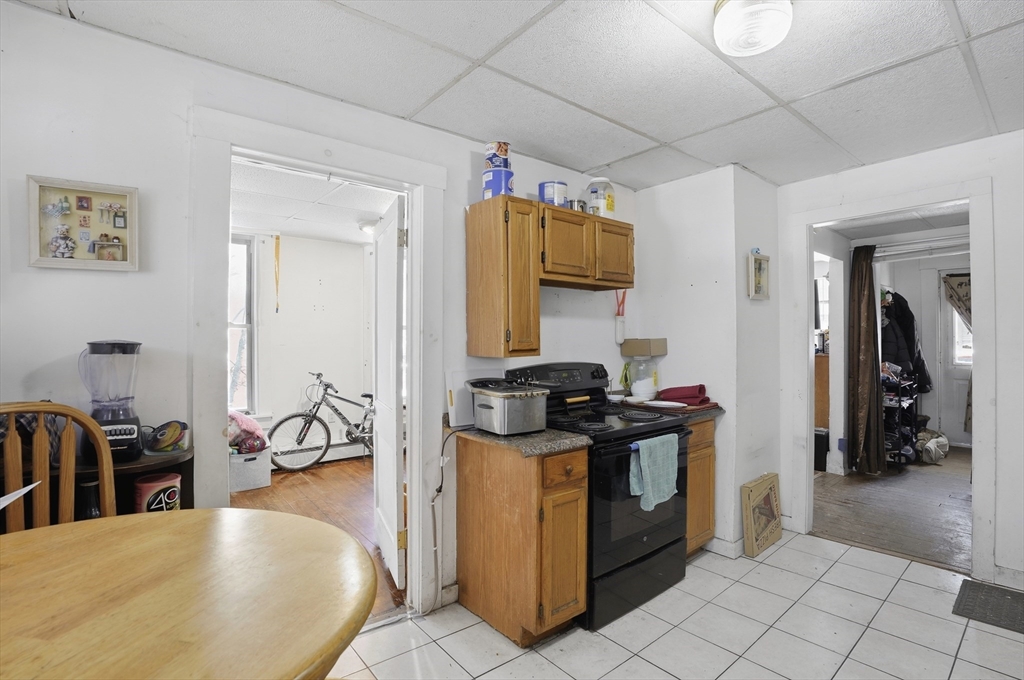 52-56 Green Street Athol, MA 01331 - Photo 15 of 41 a kitchen with a sink appliances and cabinets