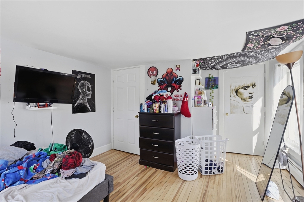 52-56 Green Street Athol, MA 01331 - Photo 21 of 41 a bedroom with a bed and flat screen tv